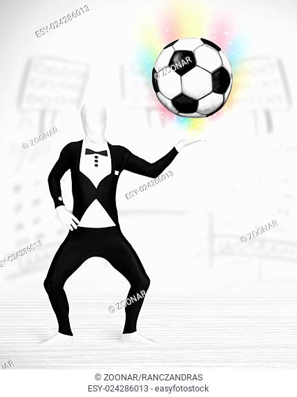 man in full body suit holdig soccer ball