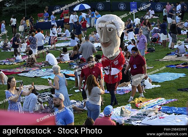 One of the Washington Nationals ‘Racing Presidents’ appears prior to United States President Joe Biden and first lady Dr