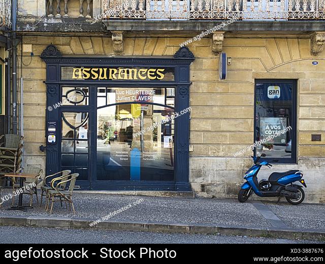 insurance office with motor scooter and cafe table, Rue Porte de la Mer, Cadillac, Gironde Department, Nouvelle-Aquitaine, France