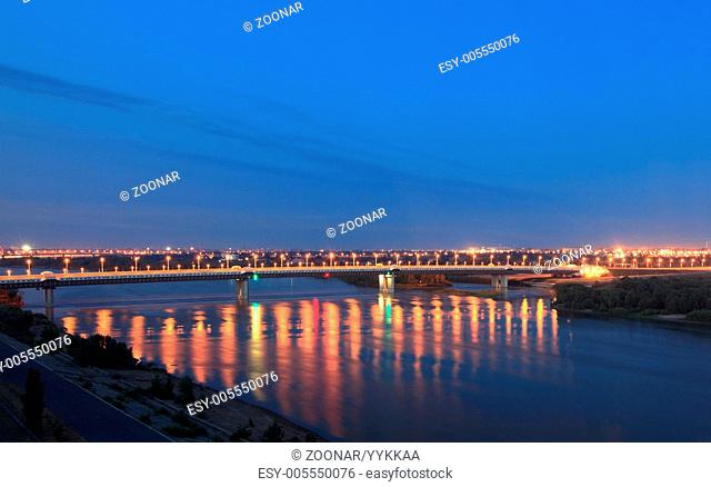 Night Bridge named after the sixtieth anniversary of victory. Irtysh River. Omsk. Russia