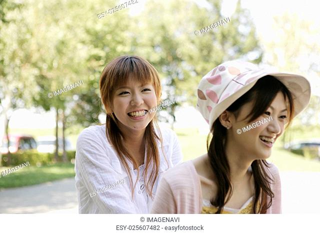 Smiling young women in the park