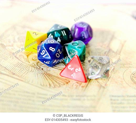 role playing dices lying on picture background