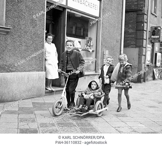 Twelve-year-old Walter has made a sidecar out of wood, a tyre and a wicker chair for his little brother, who hasn't got an own scooter (archive picture from the...