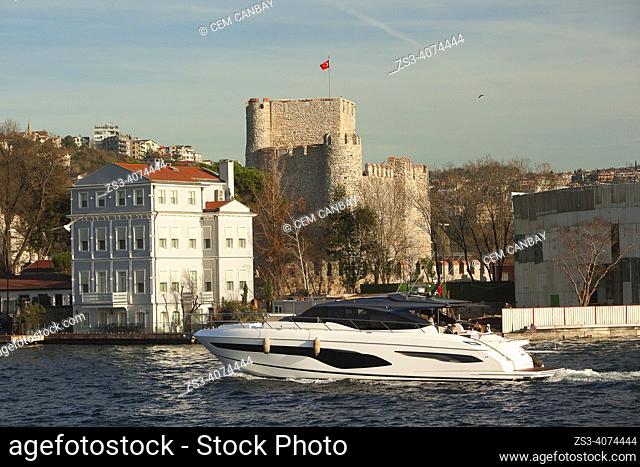 Private boat in front of Komodor Remzi Bey Yalisi and Anadoluhisari-Anatolian Castle, known historically as Güzelce Hisar