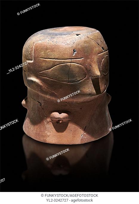 Terracotta Vase with female face. Catalhoyuk Collections. Museum of Anatolian Civilisations, Ankara. Against a black background