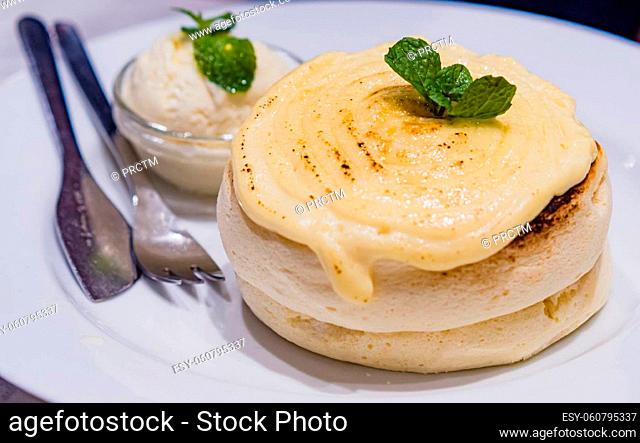 Japanese dessert. Fluffy Japanese Souffle Pancakes serve with vanilla ice cream