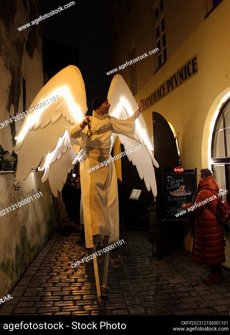 Giant angels on stilts are walking through Prague's city center, Czech Republic, December 9, 2023. Angels wishing people a happy Advent and a merry Christmas