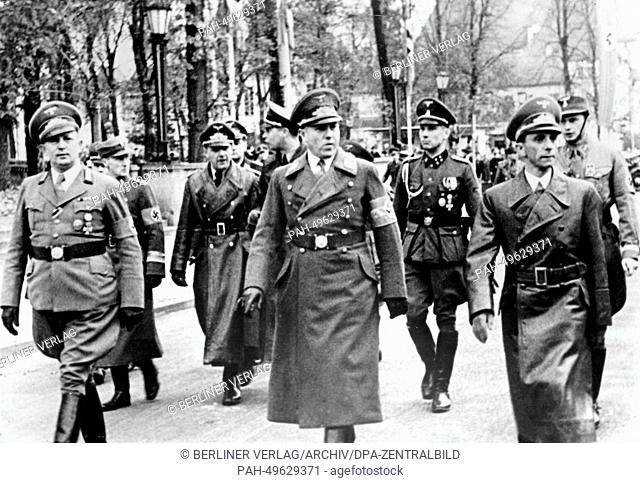 The Nazi propaganda picture shows Propaganda Minister Joseph Goebbels (R) arriving for the tenth anniversary of Gau Danzig in Danzig, Poland, October 1940