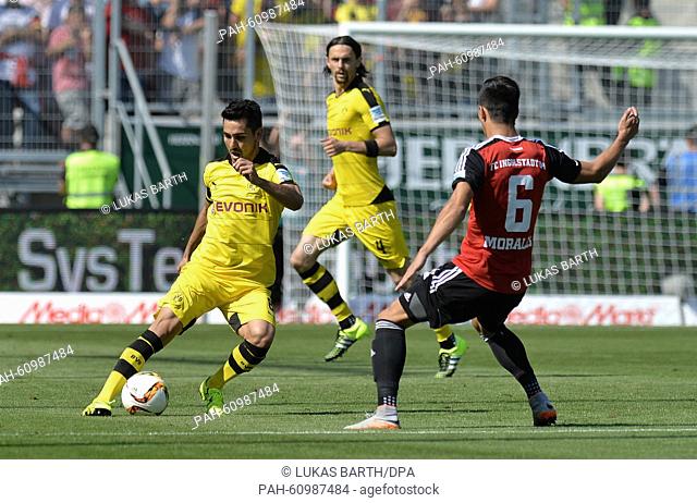 Ingolstadt's Alfredo Morales (R), Dortmund's Ilkay Gündogan (L) and Neven Subotic (C) vie for the ball during the German Bundesliga soccer match between FC...