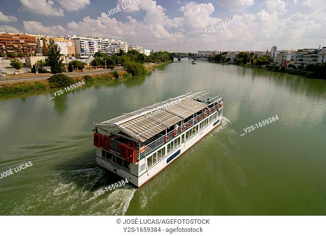 Tourist ship and Guadalquivir river  Sevilla  Spain