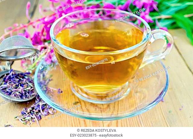 Herbal tea from fireweed in cup with strainer