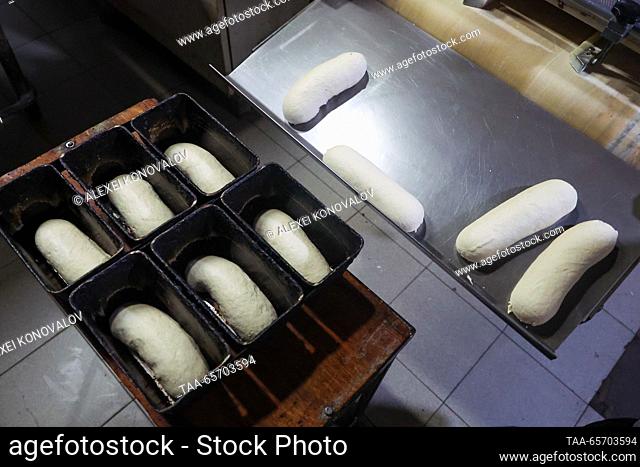RUSSIA, GENICHESK - DECEMBER 12, 2023: Pieces of dough are seen at the Genichesk bakery, part of the Dnipro company. Alexei Konovalov/TASS