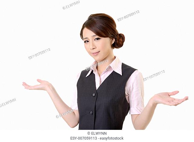 Helpless young business woman shrugs her shoulders on white background