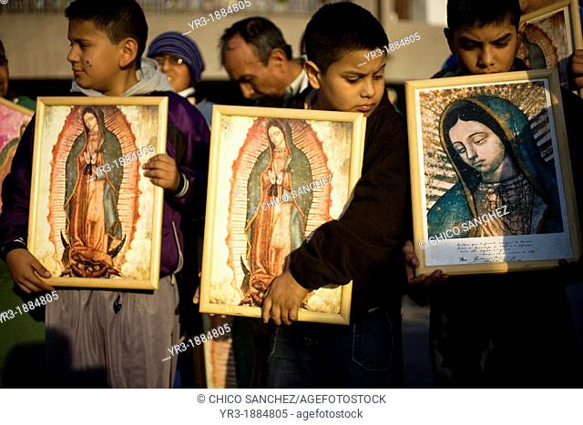 Young pilgrims carry an image of the Our Lady of Guadalupe outside of the Our Lady of Guadalupe Basilica in Mexico City, December 9, 2012