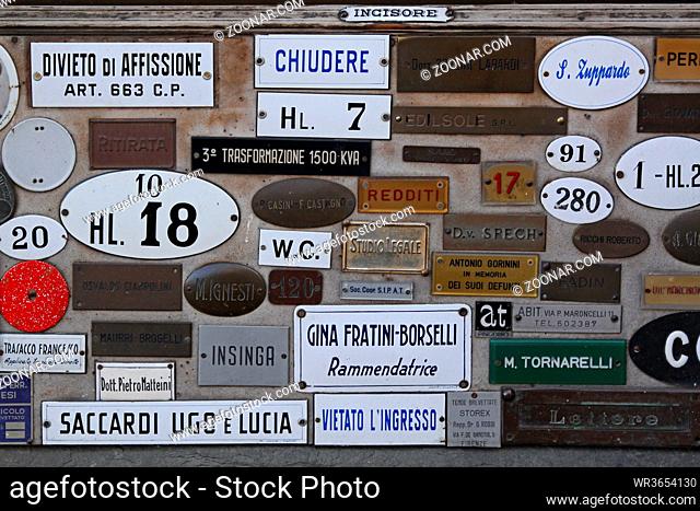 Florence, Italy - September 29, 2009: Old Style Door Signs and Name Plates in Firenze, Italy