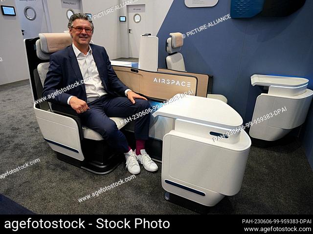 06 June 2023, Hamburg: Ingo Wuggetzer, head of cabin marketing at aircraft manufacturer Airbus, sits in a business class seat of an Airspace cabin at the...