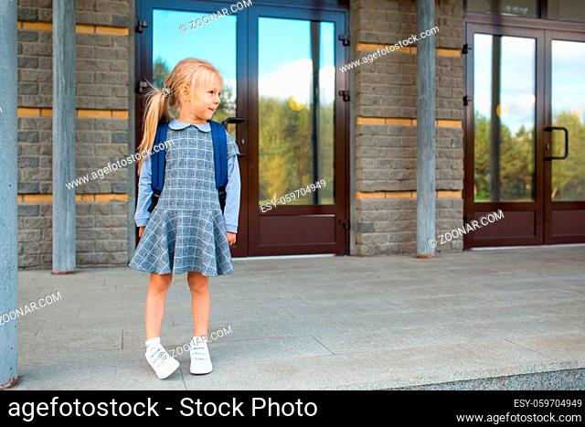Cute little girl with backpack going back to school