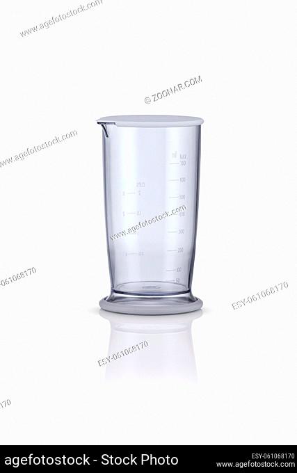 measuring beaker on a white background with reflection. kitchen appliances