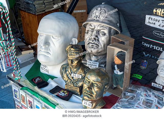 Souvenir shop, heads of Mussolini and fascist symbols in a shop window, glorification of fascism, birthplace of Mussolini, Predappio, Emilia-Romagna, Italy