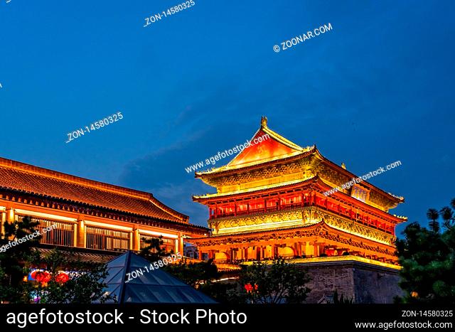 Xian, China - July 2019 : Xian Bell Drum Tower beautifully lit and illuminated at night, Shaaxi Province