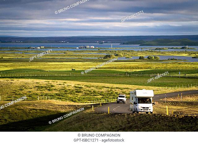 CAMPING CAR ON A ROAD NEAR THE PSEUDO CRATER IN THE AREA OF LAKE MYVATN, NORTHERN ICELAND, EUROPE