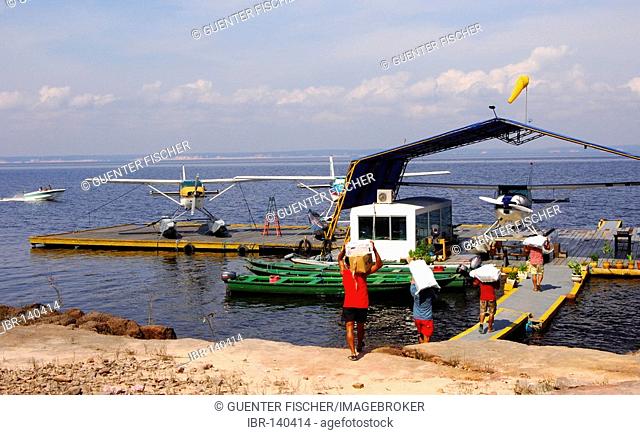 Preparations for take-off, parking waterplanes at the Rio Negro, Manaus, Brasil