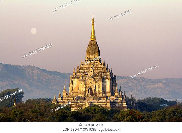 Myanmar, Mandalay, Bagan. Dawn and moonrise over the Gawdawpalin Temple in Bagan in Myanmar