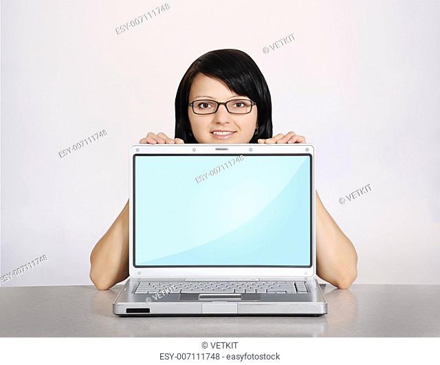 happy woman with laptop on a white background