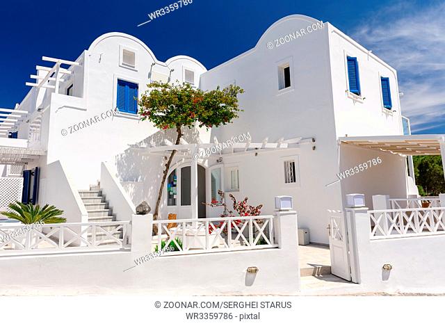 View to most typical kind of luxury pension building in Oia, Santorini, Greece