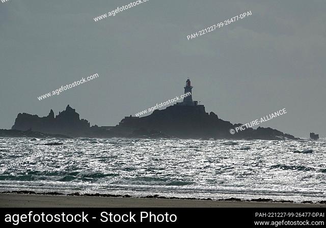 08 September 2022, ---, Jersey: The lighthouse of La Corbiere can be seen in the distance. It is one of the most important landmarks of the Channel Island of...
