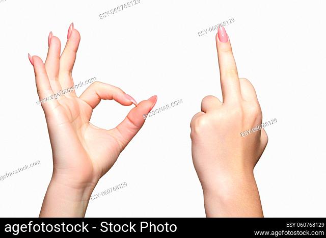 OK and fuck sign. Female hands with woman's professional natural perfect nails manicure isolated on white background