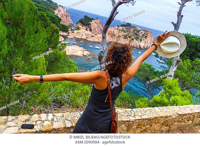 Woman in a viewpoint. Aigua Xelida, Palafrugell. Costa Brava, Gerona. Catalonia, Spain, Europe