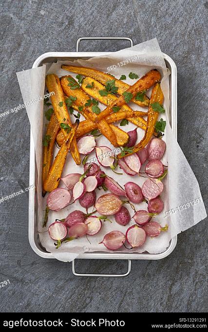Oven-roasted sesame seed carrots and honey-glazed radishes