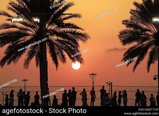 Spectators at sunset, F1 Grand Prix of Abu Dhabi at Yas Marina Circuit on November 24, 2023 in Abu Dhabi, United Arab Emirates. (Photo by HOCH ZWEI)