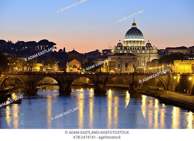 Rome. Italy. View of St Peter's Basilica, the river Tiber & Ponte Sant' Angelo