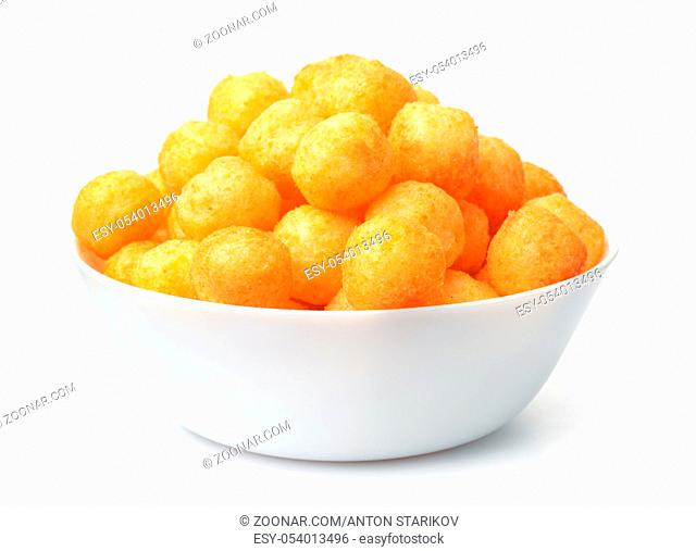 Bowl full of cheese puff balls isolated on white