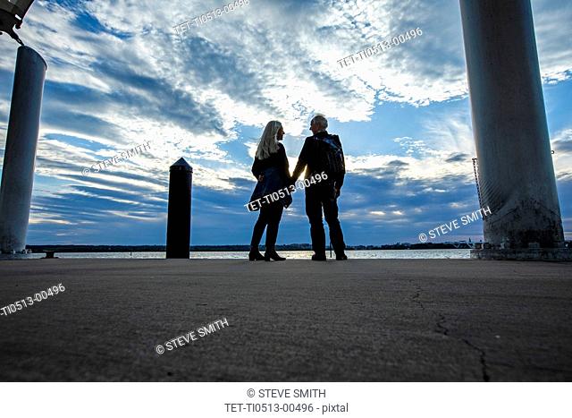 Couple by Potomac River in Washington DC, USA