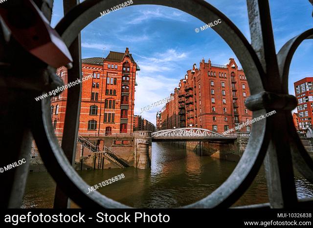Historic warehouse district in Hamburg, Germany, Europe, old brick buildings and canal of the Hafencityviertel, UNESCO heritage