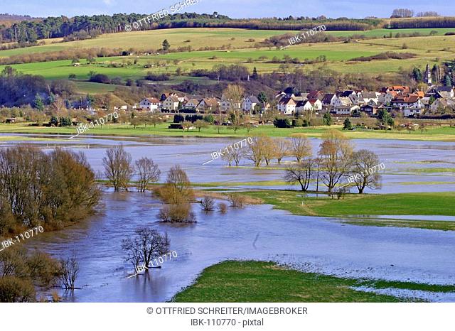 Flood in spring with awashed grassland and meadows, Lahn valley, Hessen, Germany