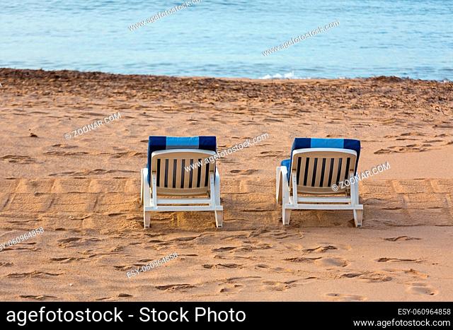 Two Deck Chairs at Sandy Beach Riviera