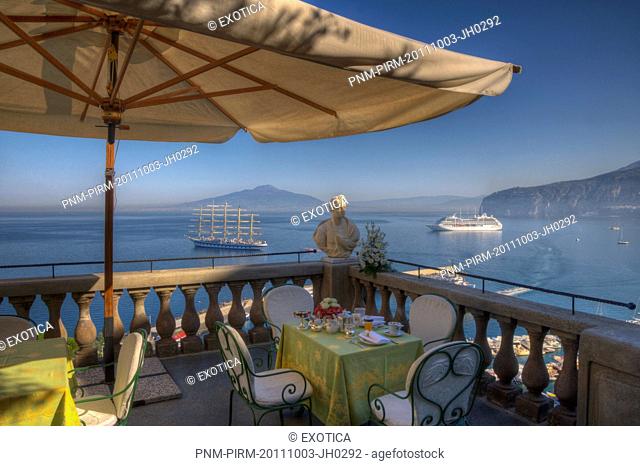 Bust on the balcony of a terrace with the sea in the background, Sorrento, Campania, Italy