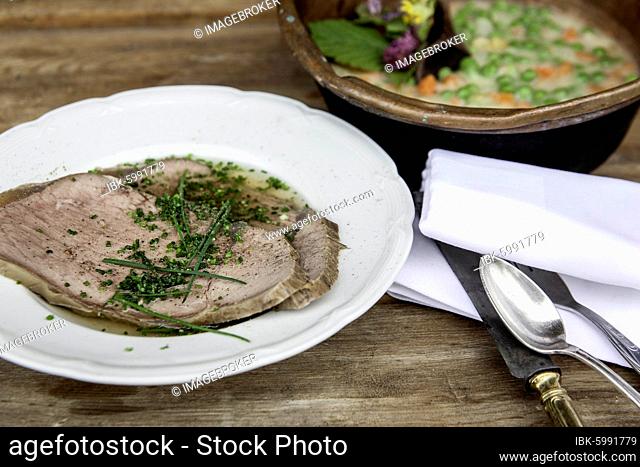 Boiled boiled beef with beef soup and chives, peas and carrots as creamy vegetables, Rauris, Pinzgau, Salzburger Land, Austria, Europe