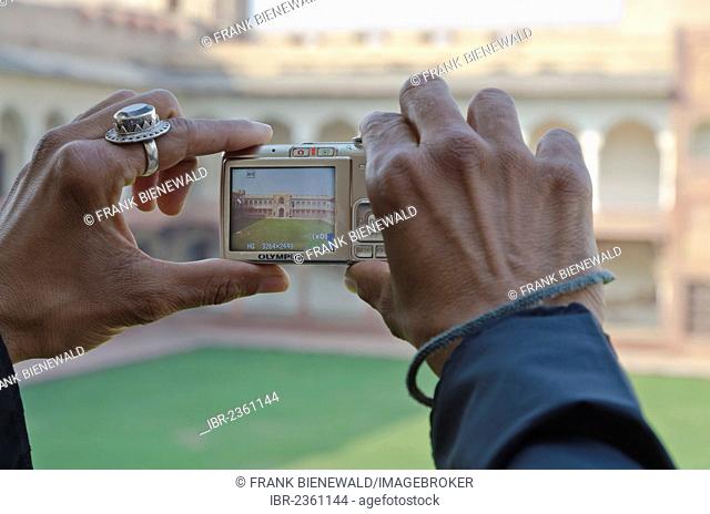 Indian tourist taking a photograph at Agra Fort, Agra, India, Asia