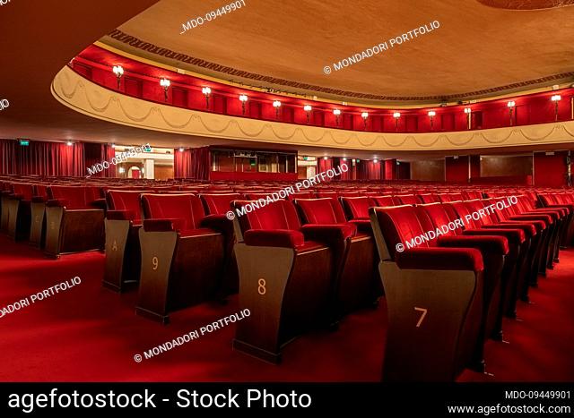 The stalls and boxes inside the Teatro Manzoni, entirely covered with red velvet upholstery. Milan (Italy), December 29th