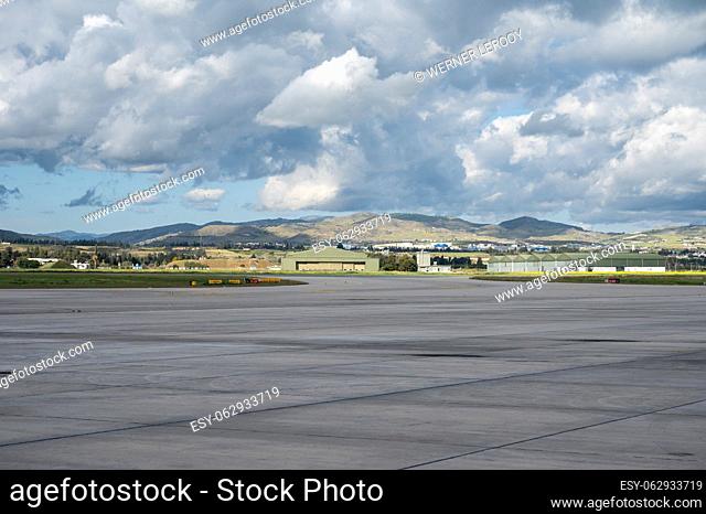 Paphos Airport, Cyprus - March 20, 2023 - View over the Paphos PFO international airport with the mountains in the background
