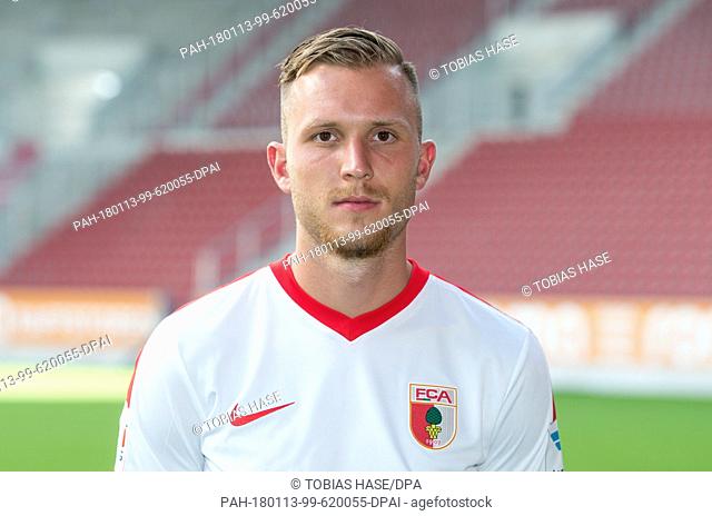 FILE - A file picture dated 28 July 2016 shows player Tim Rieder at a'n FC Augsburg photo call for the 2016/17 season at the WWK Arena in Augsburg, Germany