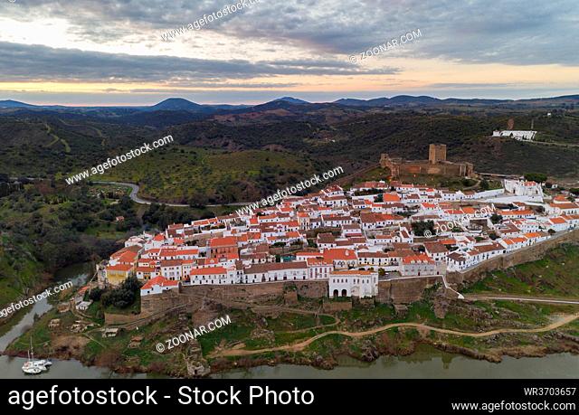 Aerial drone view of Mertola in Alentejo, Portugal at sunset