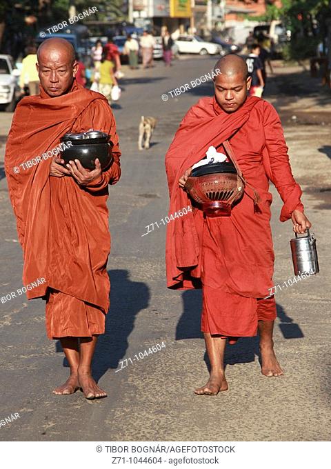 Myanmar, Burma, Yangon, Rangoon, monks with alm bowls