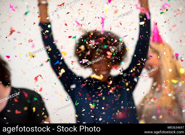 confetti party happy young people group celebrating new year eve while dancing and have fun at home
