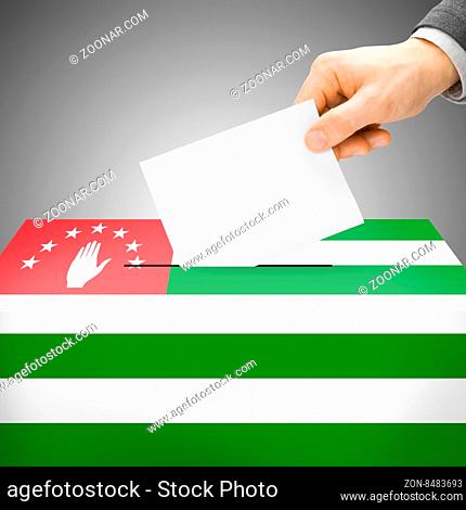 Voting concept - Ballot box painted into national flag colors - Abkhazia